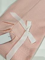 Light pink knit blanket